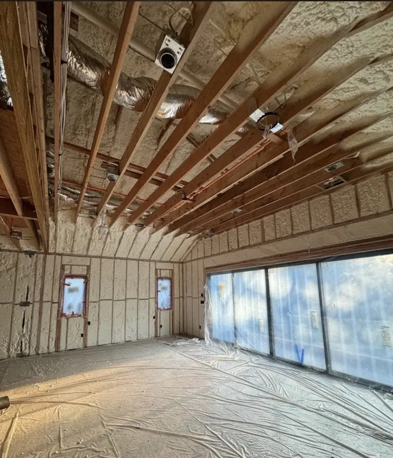 Interior walls and ceiling insulated with spray foam during new construction in Fenton